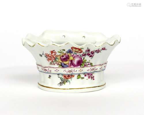 A Chelsea bough pot c.1755, the fluted D section finely painted with a spray of flowers including
