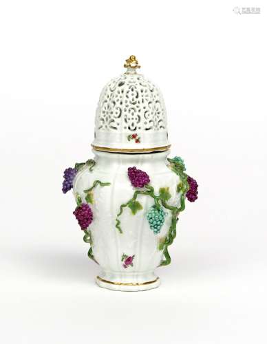 A Meissen sugar caster mid 18th century, the baluster body moulded with flower sprays and applied