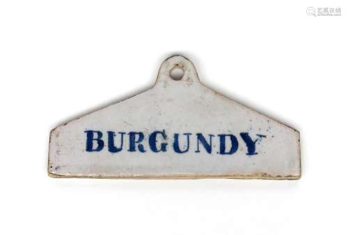 A rare delftware bin label c.1770-80, of coathanger form, inscribed in blue with 'Burgundy', 13.