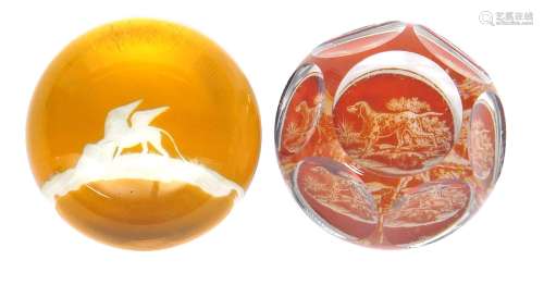 Two Bohemian glass paperweights 2nd half 19th century, one cut with the Lion of St Mark on an