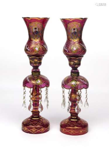 A pair of Bohemian glass lustre lamps for the Persian market 19th/20th century, the cranberry glass