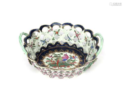 A Worcester basket c.1770, the oval form painted to the well with exotic birds in flight above and