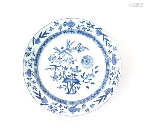 A large and early Meissen charger c.1731-38, painted in underglaze blue with the Zweibelmuster or