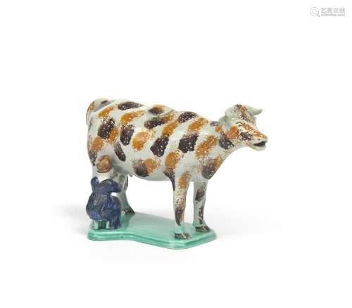 A Staffordshire pearlware cow creamer and cover late 18th/early 19th century, standing four square