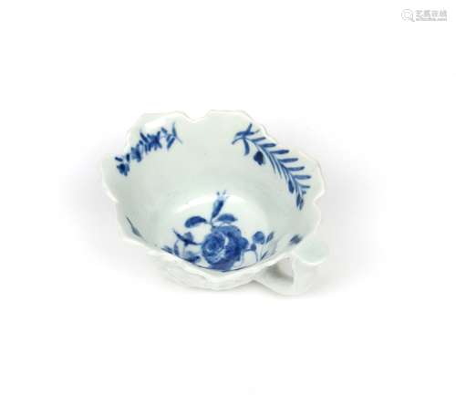 A Worcester blue and white butterboat c.1760, painted with the Butterboat Formal Rose pattern, the