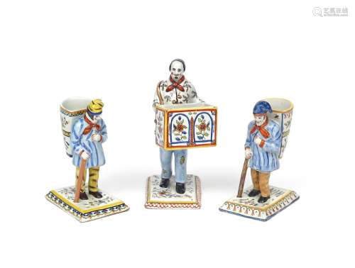 Three French faïence spill or match figures 19th century, two formed as peasant travellers with an