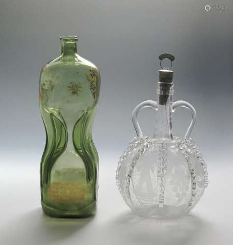 A Union decanter c.1820, the tall pinched-waist form of a pale green metal, inscribed in gilt relief
