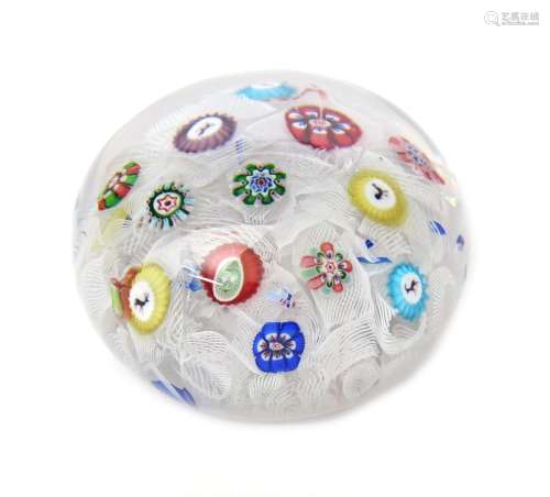 A Baccarat spaced millefiori paperweight dated 1848, set with thirteen individual canes including