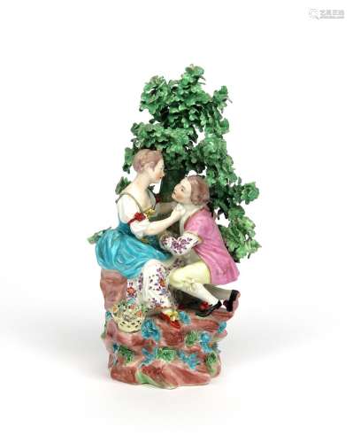 A Derby figure group of 'The Knot in the Cravat' c.1775, of two lovers beneath a leafy tree, he