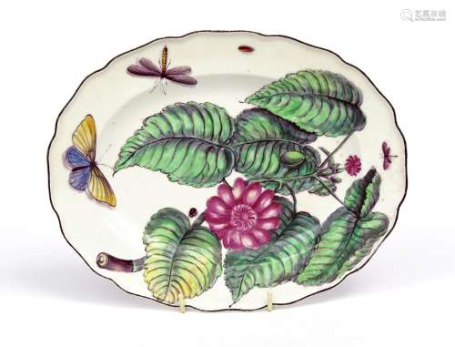 A Chelsea Hans Sloane oval dish c.1755, painted with a bold botanical specimen beside a butterfly