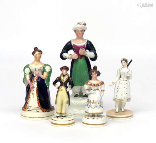 Five English porcelain theatrical figures 1st half 19th century, one of Madame Vestris as the