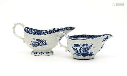 Two large English porcelain blue and white sauceboats c.1770, the larger Derby printed with