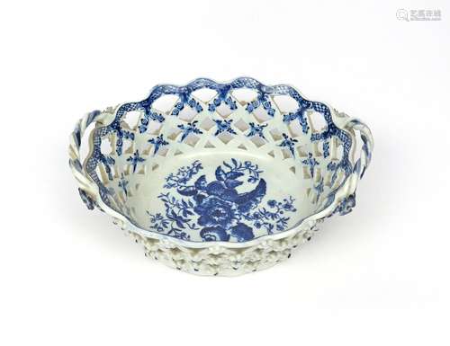 A Lowestoft blue and white basket c.1775-80, printed with the Pinecone pattern, the oval form with