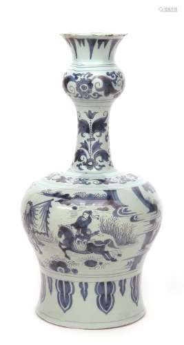 A tall Delft vase c.1670, the baluster body painted with scenes of Chinese figures on horseback