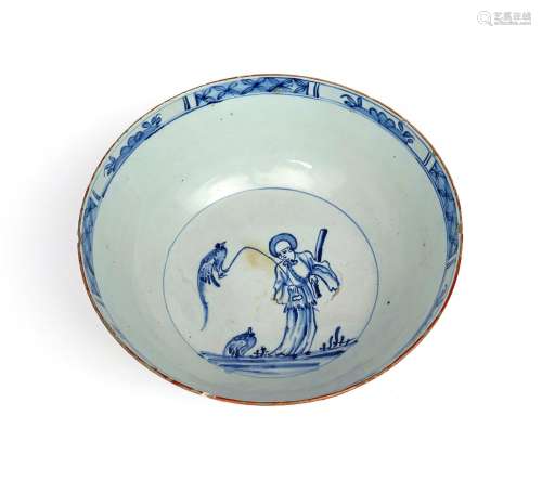A large delftware punchbowl c.1750-70, painted in blue to the interior with a single Chinese