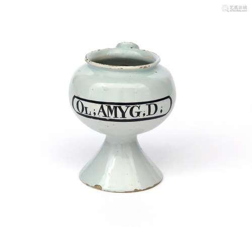 A rare London delftware syrup jar c.1780, the small globular form inscribed 'Ol; AMYG,D.' in