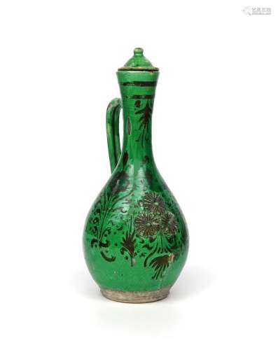 A large Canakkale (Turkey) ewer and cover 19th century, the tall bottle form glazed a rich green and