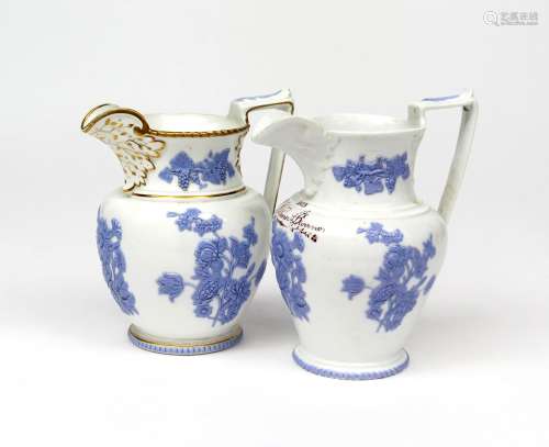 Two Samuel Alcock porcelain jugs c.1840, sprigged in lilac with bold flower sprays on a white