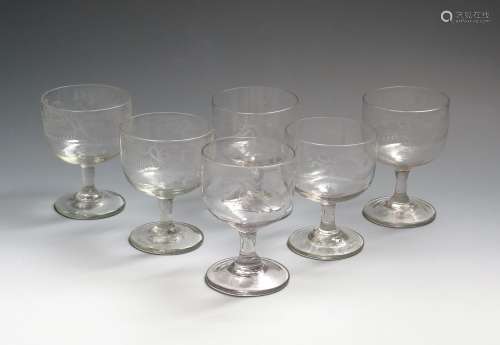 Six Irish glass engraved rummers 19th century, probably Cork, the rounded cup bowls engraved with
