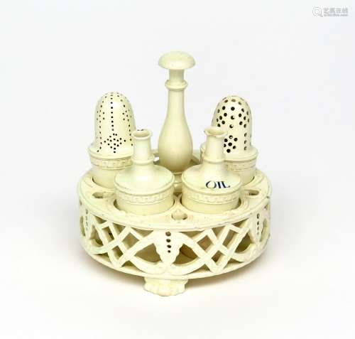 A Wedgwood creamware cruet or condiment stand late 18th/early 19th century, the circular stand