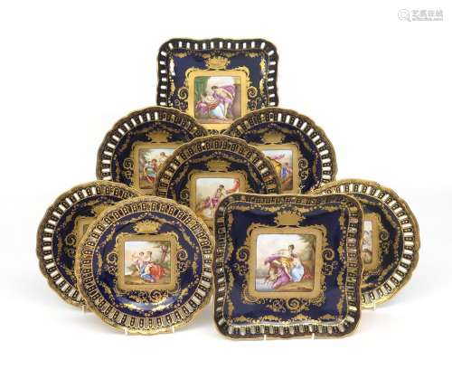 A Vienna-style part dessert service 19th century, the wells painted with square panels of