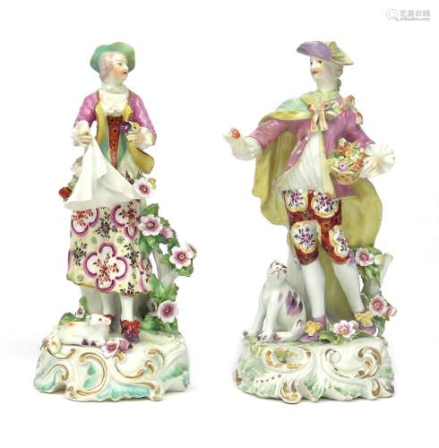 A pair of Derby figures of the Dresden Shepherds c.1760, he holding a basket of fruit and proffering