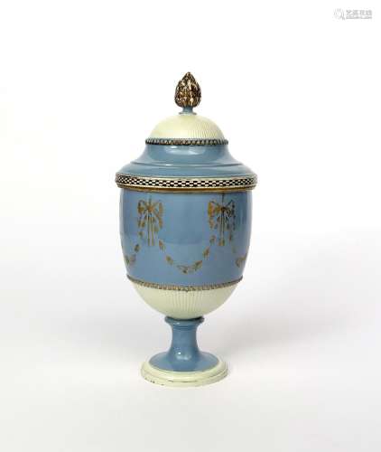 A Leeds pearlware vase and cover c.1790, the footed urn shape moulded with a band of reeding near