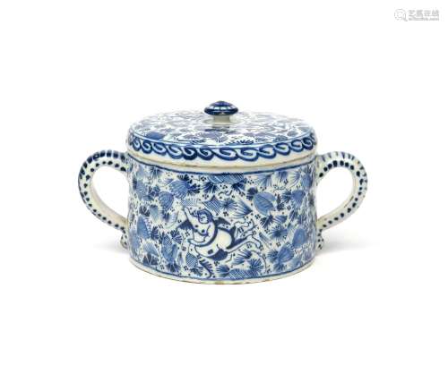 A Lambeth delftware posset pot and cover c.1750, the squat cylindrical form painted in blue with