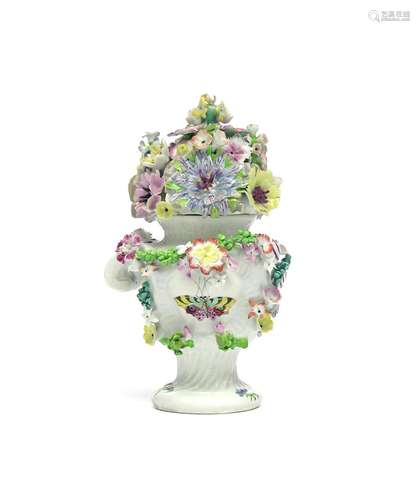 A Longton Hall vase and cover c.1758-60, of asymmetrical rococo form, painted with colourful