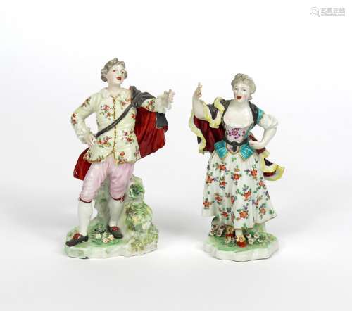 A rare pair of Derby figures of the Singing Shepherds c.1760-65, each standing in mirrored pose with