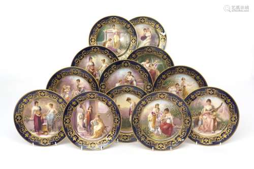A set of twelve Vienna-style cabinet plates late 19th century, each painted with a different scene