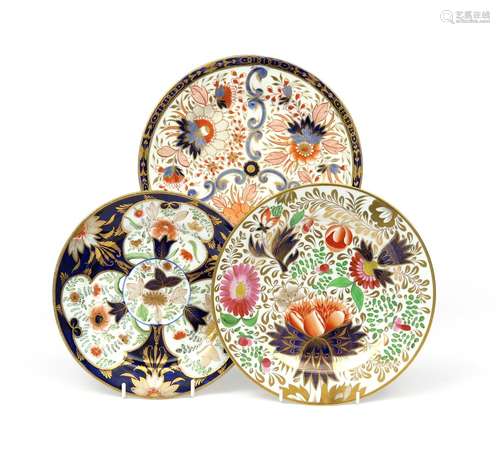 Three Coalport plates 1st half 19th century, variously decorated in the Imari palette with panels of