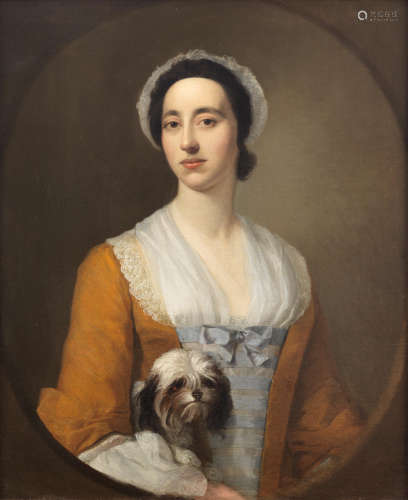 Portrait of a lady, half-length, in an orange dress holding a dog, within a painted oval Joseph Highmore(London 1692-1780 Canterbury)