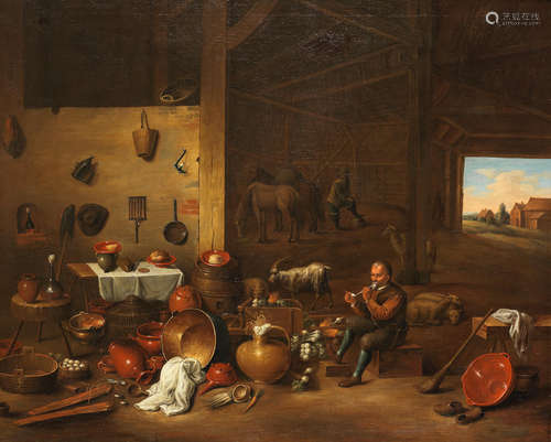 A figure smoking a pipe in a barn interior Dutch School18th Century