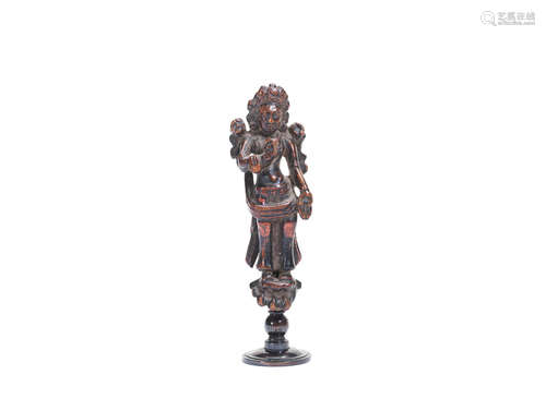 Tibet or Nepal, probably 12th century A lacquered wood figure of a standing Bodhisattva