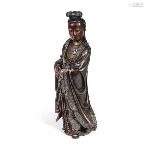 17th/18th century A large painted and gilt lacquered wood carving of Guanyin