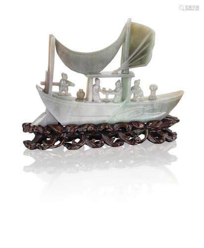 19th century A large jadeite carving of a sailing boat with four figures