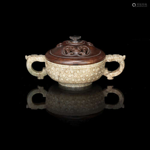 Ming Dynasty A mottled creamy jade twin-handled cup