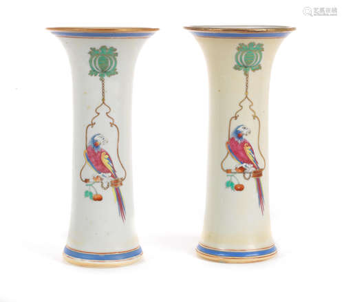 Qianlong, circa 1740 A pair of enamelled Pronk 'parrot on a perch' beaker vases