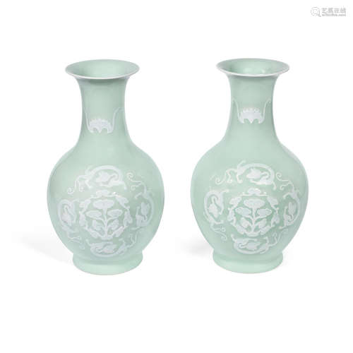 Late Qing Dynasty A pair of celadon-glazed slip-decorated bottle vases