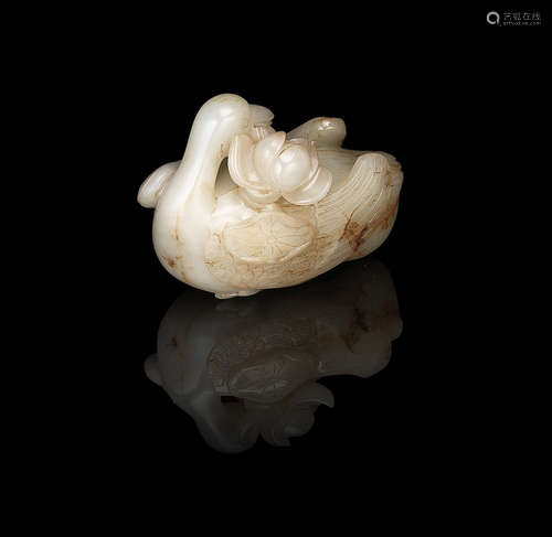 A white and russet jade carving of a mandarin duck