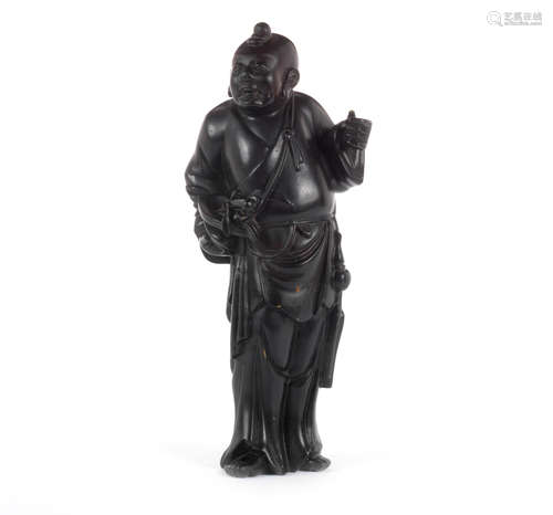 Qing Dynasty A bronze figure of the Daoist Immortal Lan Caihe