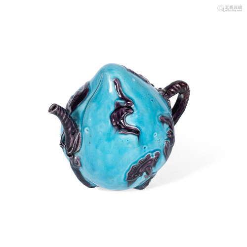 19th century A turquoise and aubergine-glazed peach-form 'Cadogan' teapot