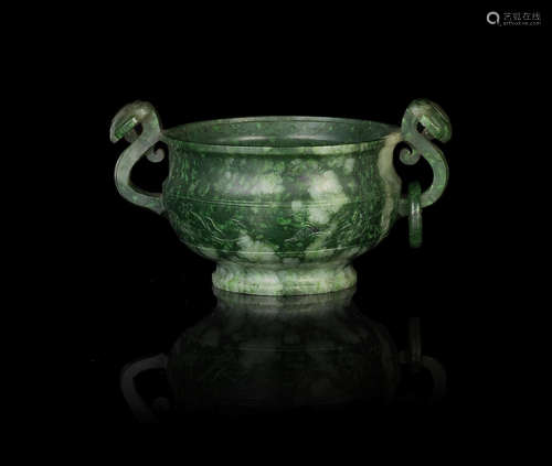 China, 19th century A spinach green jade two-handled incense burner