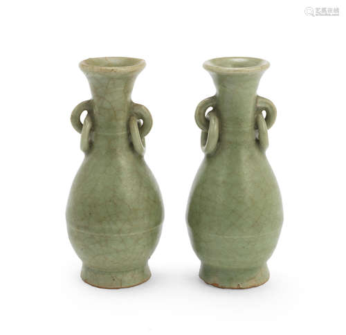 13th/14th century A small pair of Longquan celadon-glazed bottle vases