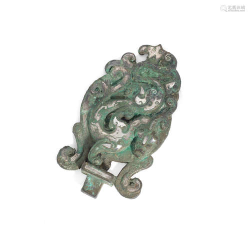 Warring States/Han Dynasty A gold and silver-inlaid bronze fitting