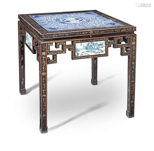 19th century A porcelain-inset lacquered hardwood table