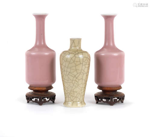 Kangxi six-character marks, 19th century A pair of small pale pink glazed bottle vases