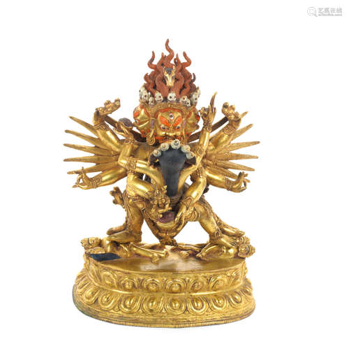 19th/20th century A gilt-bronze figure of Hayagriva and consort