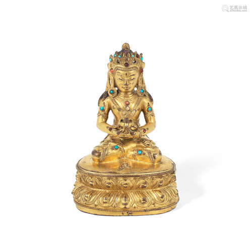 Tibet, 16th century A turquoise and hardstone-inset gilt copper-alloy figure of Amitayus